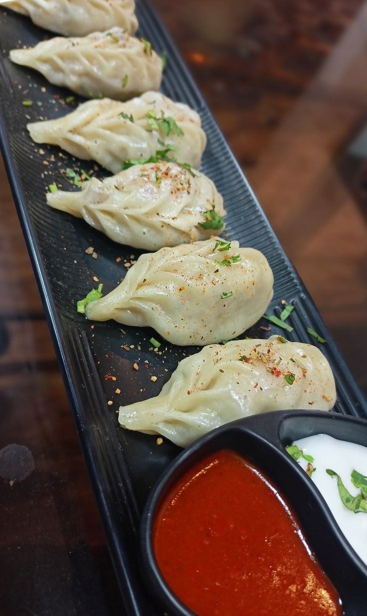 Momo Mix, empanadillas nepalíes al vapor de pollo, cerdo y verduras
